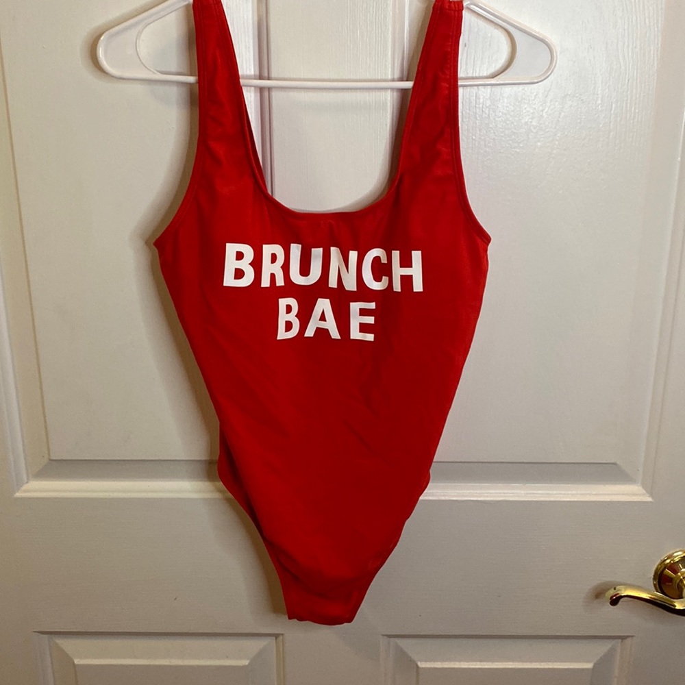 One piece red bathing suit